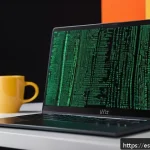 Home 19 웹 애플리케이션에서의 암호화 프로토콜 통합 - A modern web developer workspace featuring a sleek laptop displaying code with highlighted encryptio...